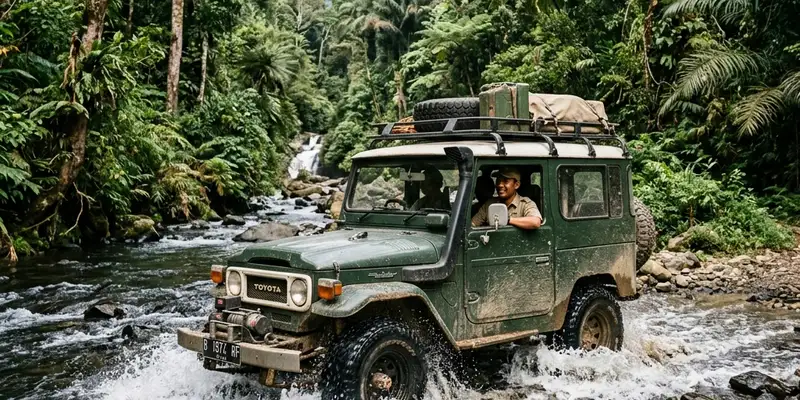 Mobil tangguh offroad menyeberangi aliran sungai berarus di belantara alam